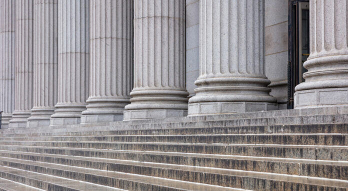 Stone pillars of a courthouse, sexual misconduct case