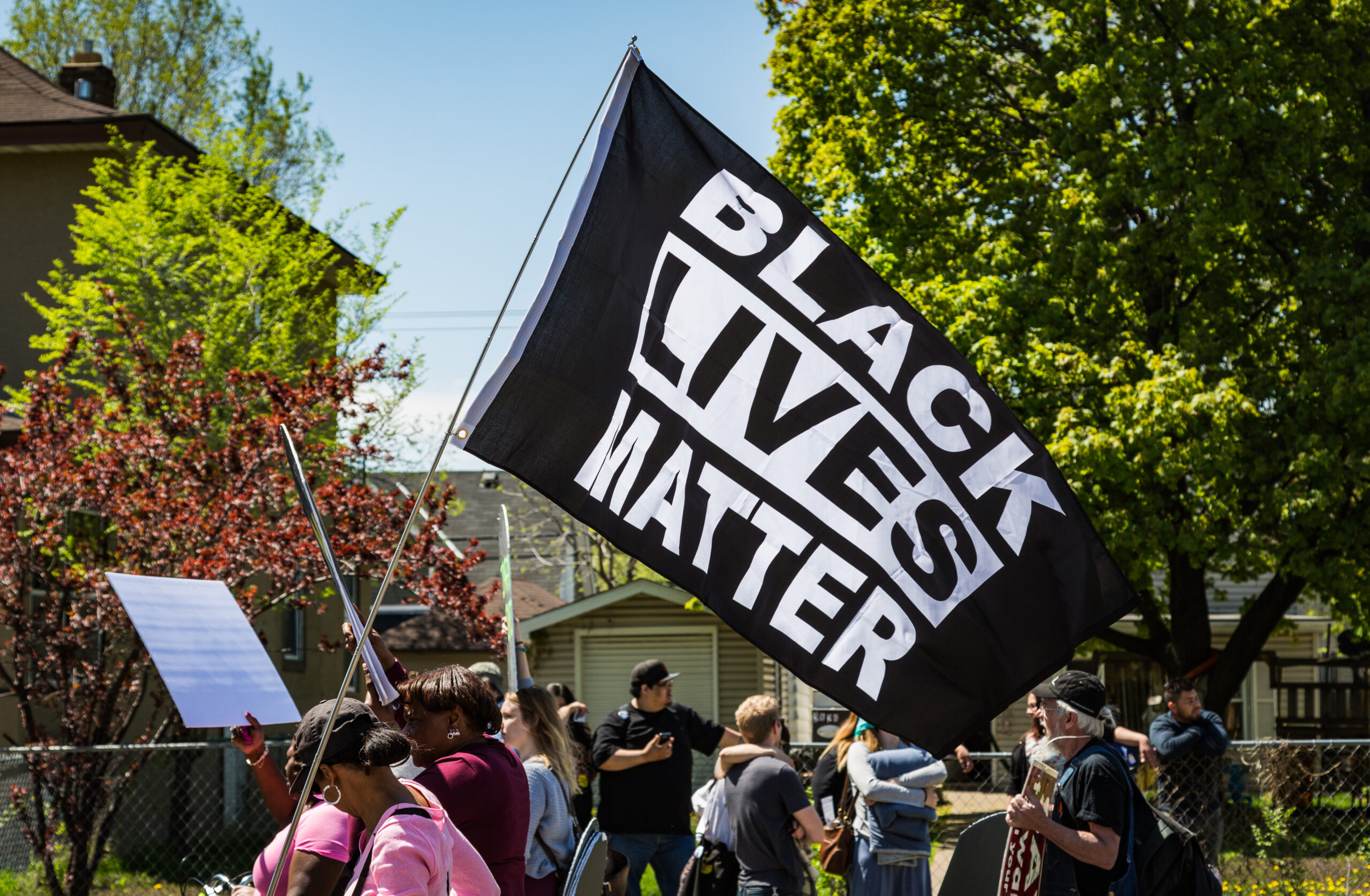 black lives matter flag at a protest