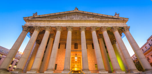 The New York Supreme Court in New York City, USA at twilight.