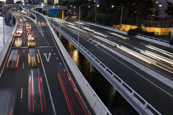 Rush hour traffic on freeway. This image was shot in Brisbane Queensland Australia. Brisbane is the state capital and has serious congestion problems at times.