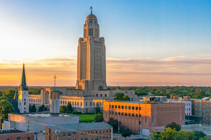 Nebraska State Capitol landscape at sunrise