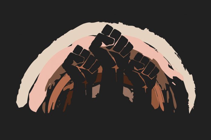 Fist protesting on background of rainbow in skin colors. No racism concept. Different races protest, interracial community unity. Modern vector in flat style. Pride month