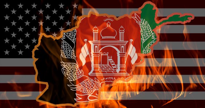 Afghanistan map and flag outline on fire against the background of the flag of the United States of America. The concept of problems in Afghanistan.