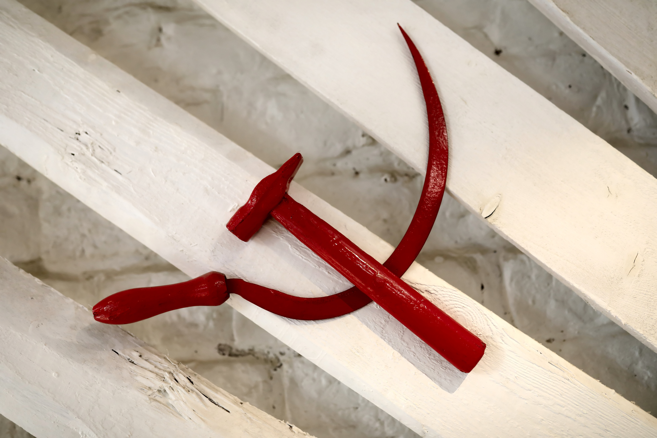 Soviet symbol hammer and sickle on wall