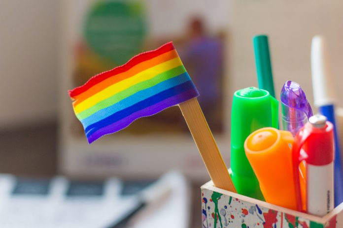 rainbow flag on a desk