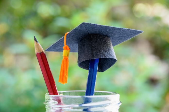 mortarboard and pencil
